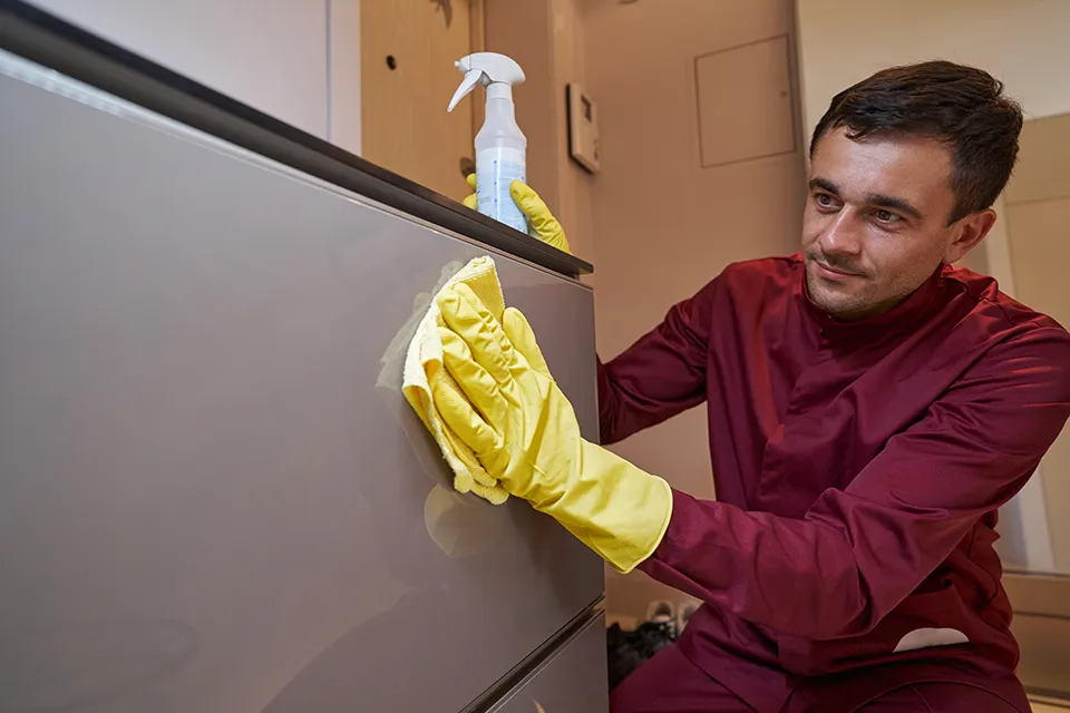 Professional cleaners equipped with advanced cleaning tools working efficiently in a Melbourne home, illustrating the high level of service provided.